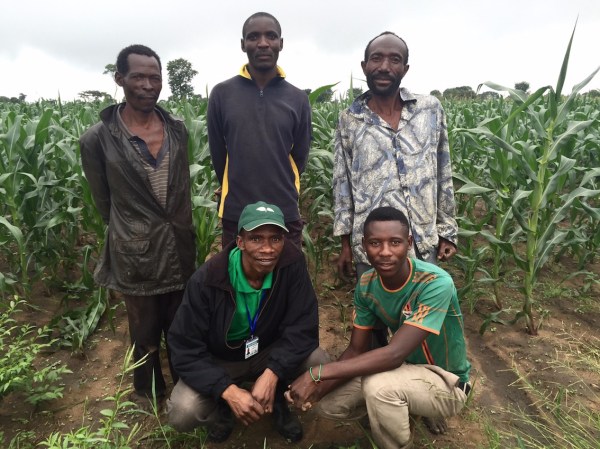 Field Officer Tembo with farmers